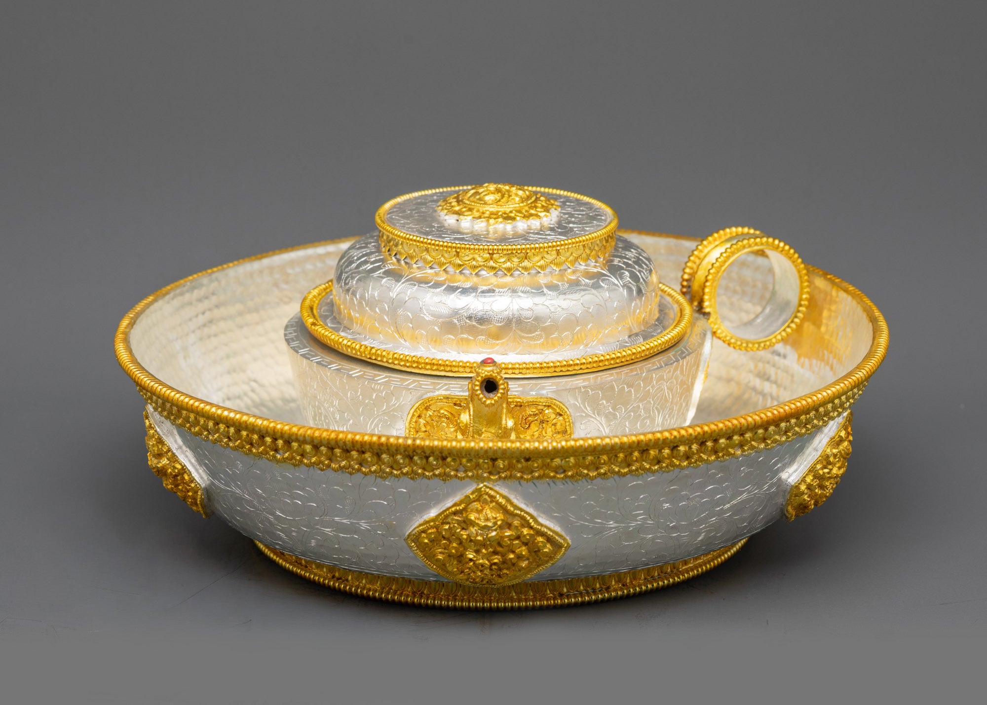 Top view auspicious offering plate with gold-plated Ashtamangala symbols