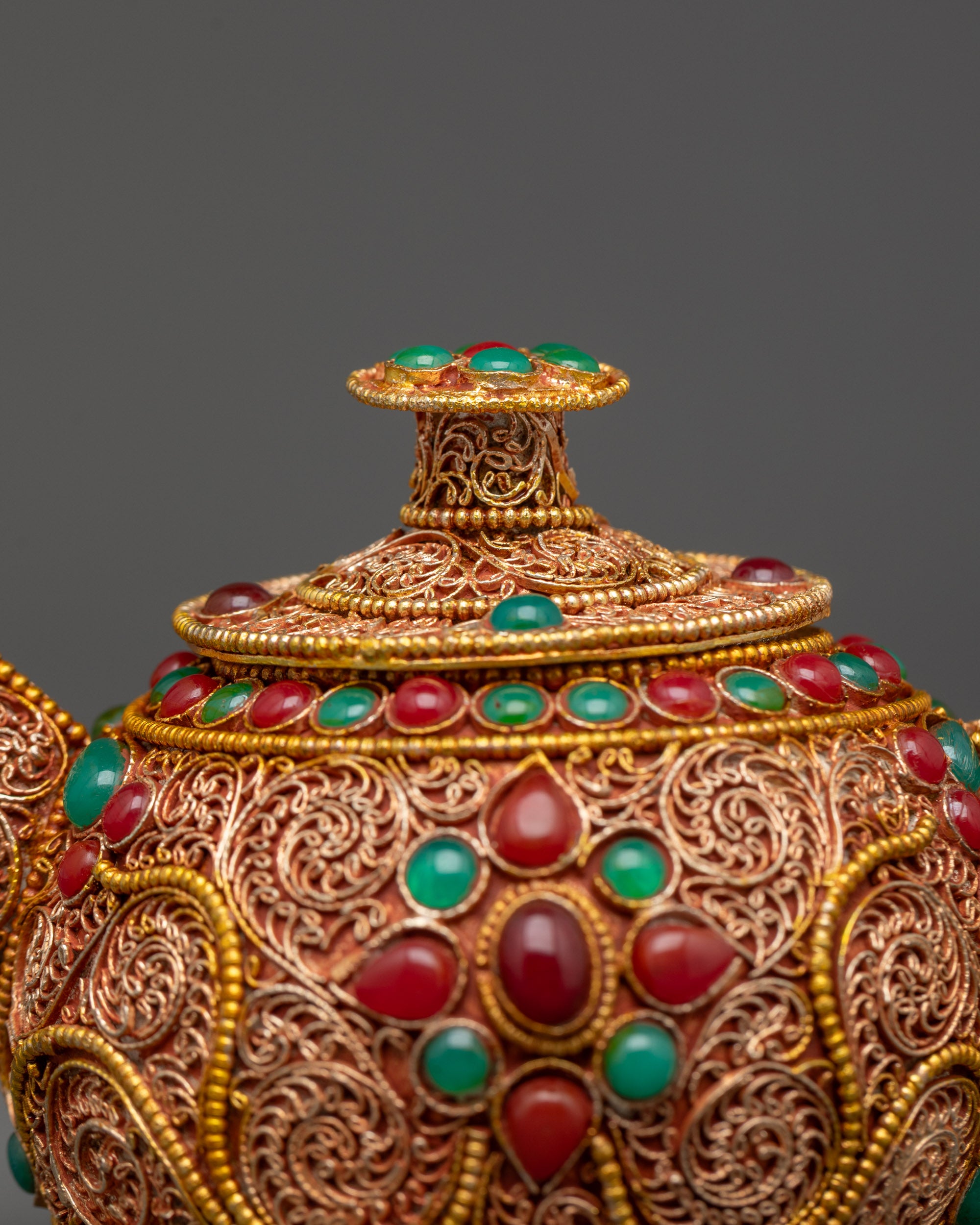 Top view gold-plated Himalayan teapot ornate filigree lid with raised ornamental knob