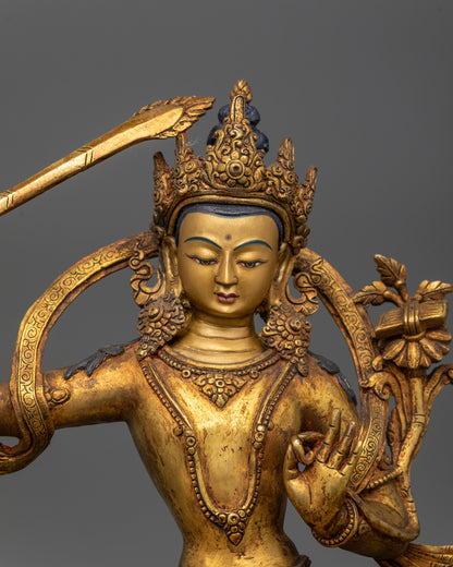 Top view of Manjushri showing double-edged sword and utpala flower
