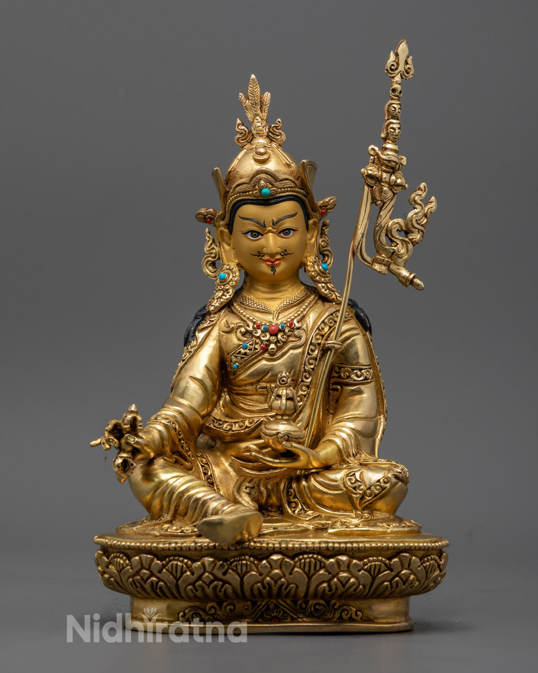 Traditional Guru Rinpoche Statue with gold-gilded face and semi-precious stone decorations