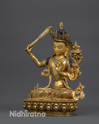 Traditional Himalayan Manjushri sculpture with intricate robe details