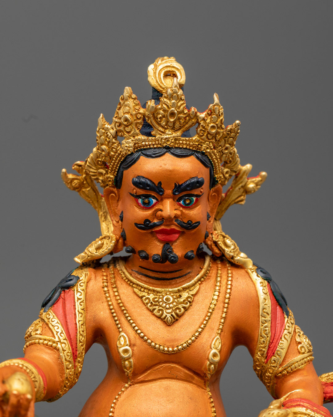 Traditional Nepalese Dzambhala sculpture crafted using the lost wax method, symbolizing wealth and prosperity.