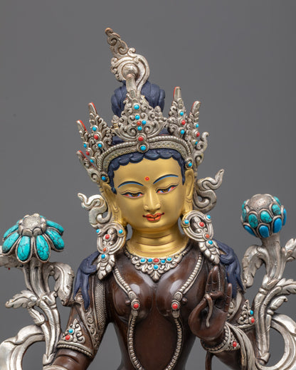 Traditional Nepalese Green Tara statue featuring vibrant acrylic colors and hollow chamber for auspicious mantras.