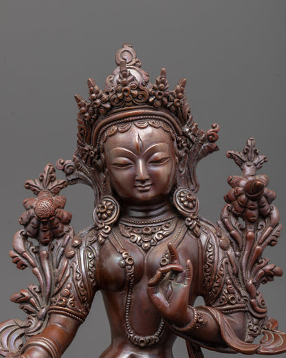 Traditional White Tara oxidized copper sculpture with intricate carvings and lotus flower