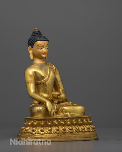 Side view of Traditional copper-based Shakyamuni Buddha sculpture featuring