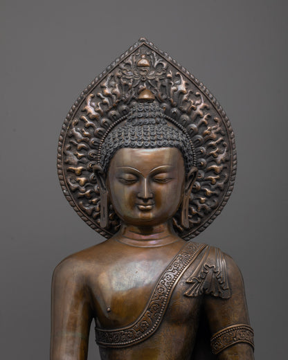 Traditional oxidized copper Buddha statue depicting Shakyamuni in serene meditation pose