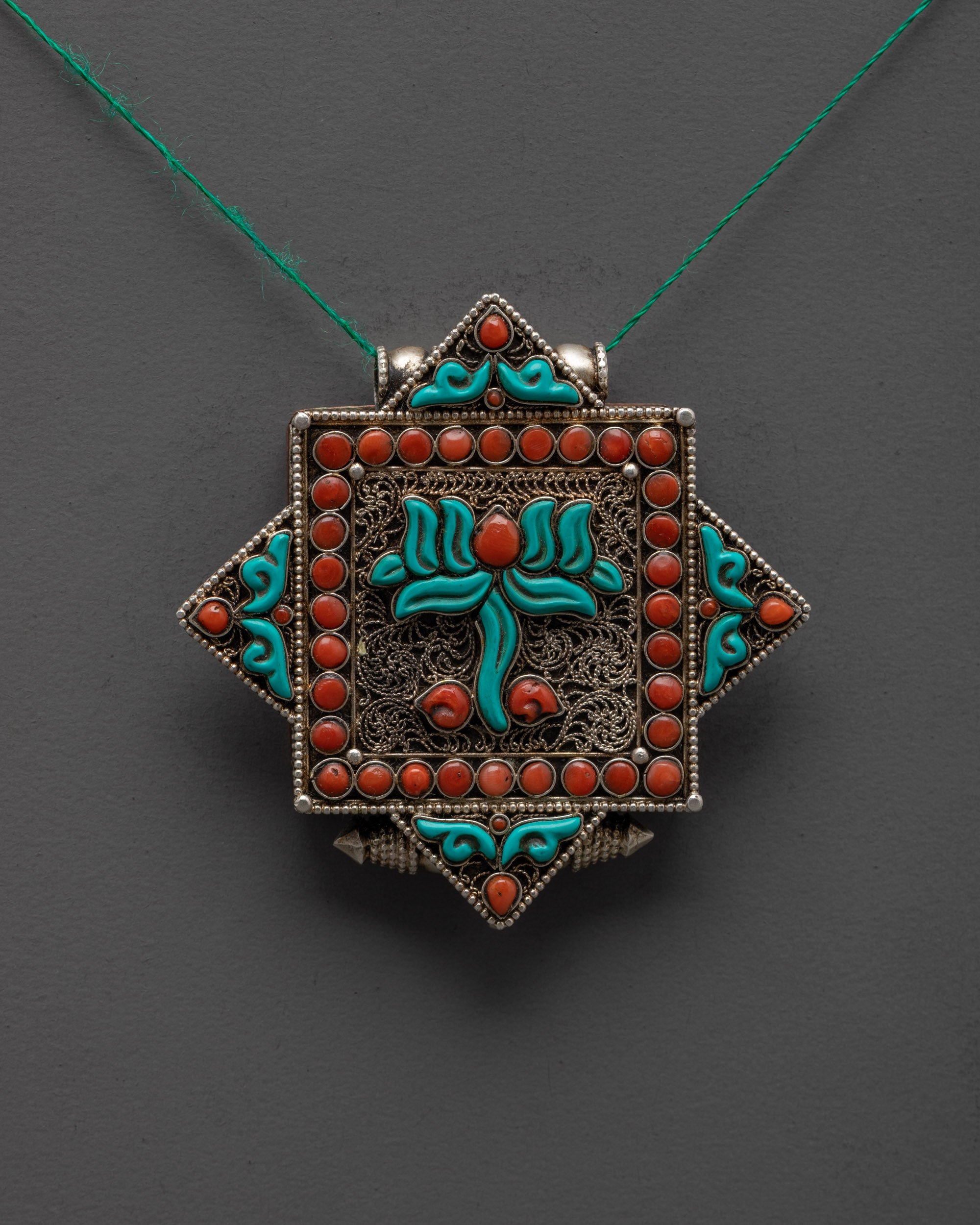 Traditionally Hand-carved Silver Lotus Design Locket with Precious Stones