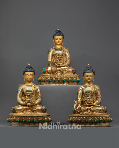 Trio Buddha Statue Set handcrafted in Nepal with 24K gold gilding on a solid copper base for spiritual blessings.

