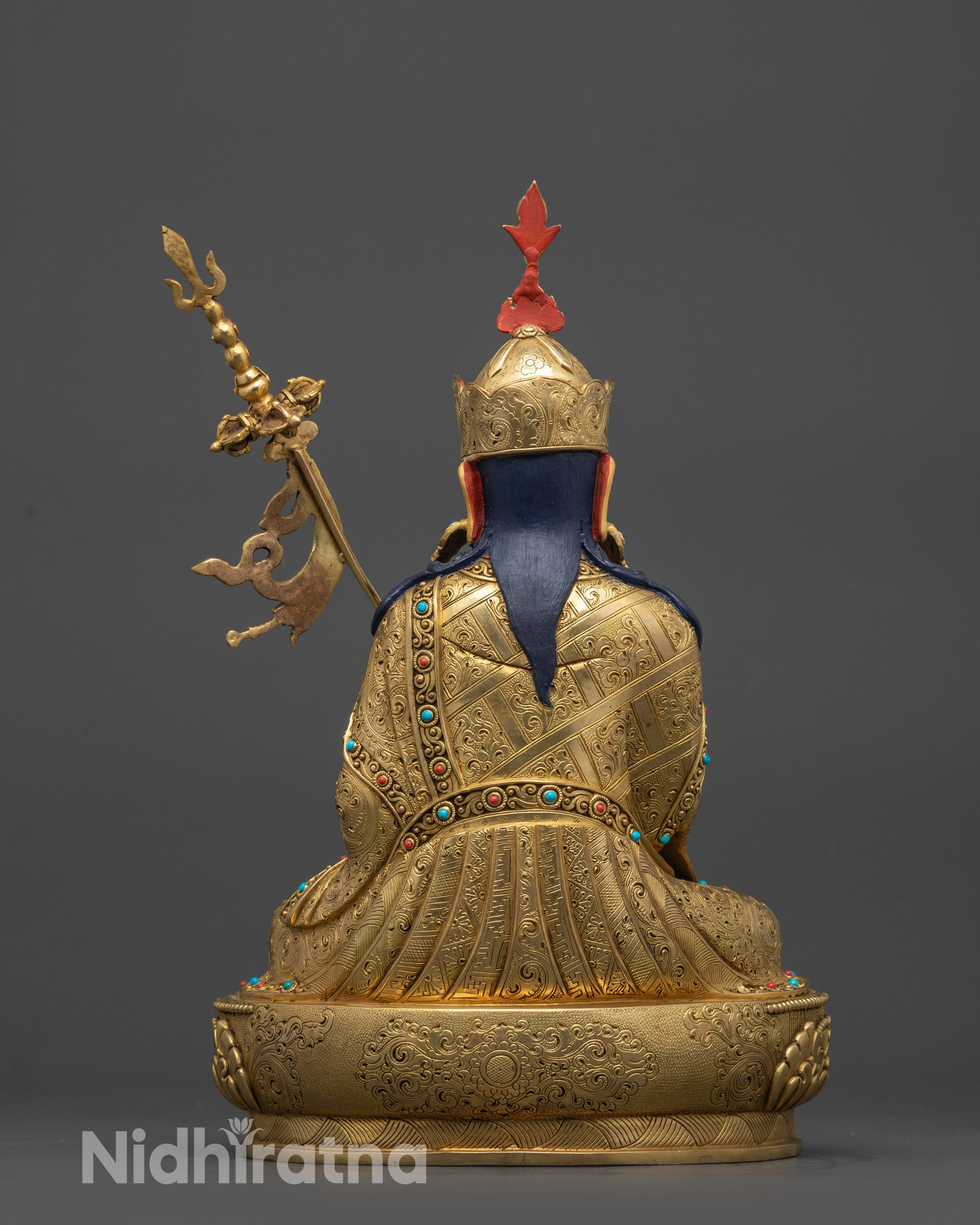 Back view Tsokye Dorje Statue adorned with lotus hat and semi-precious stones