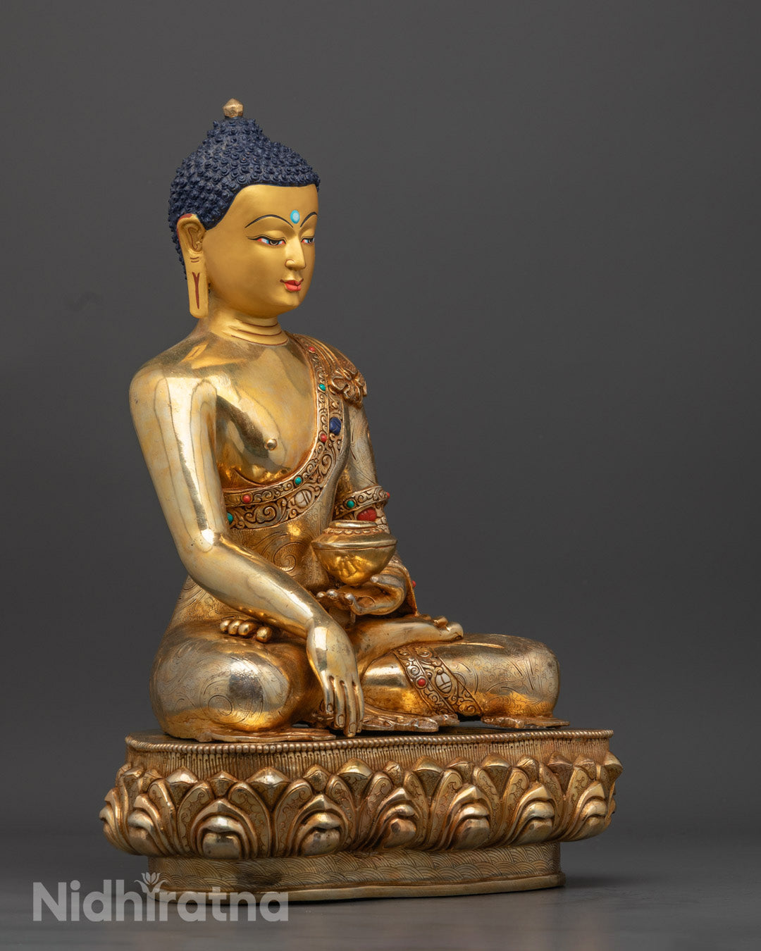 Two disciples holding Trishula (trident), representing the power to overcome ignorance and negative forces