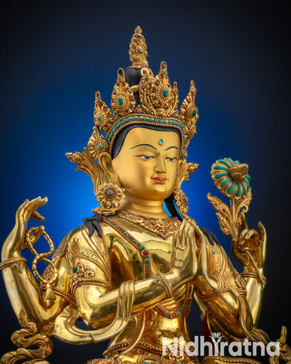 Upper close up face of Chenrezig Statue with serene expression and intricate crown details
