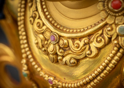 Upper view of Manjushri necklaces showing intricate gold fire-gilded details and traditional craftsmanship