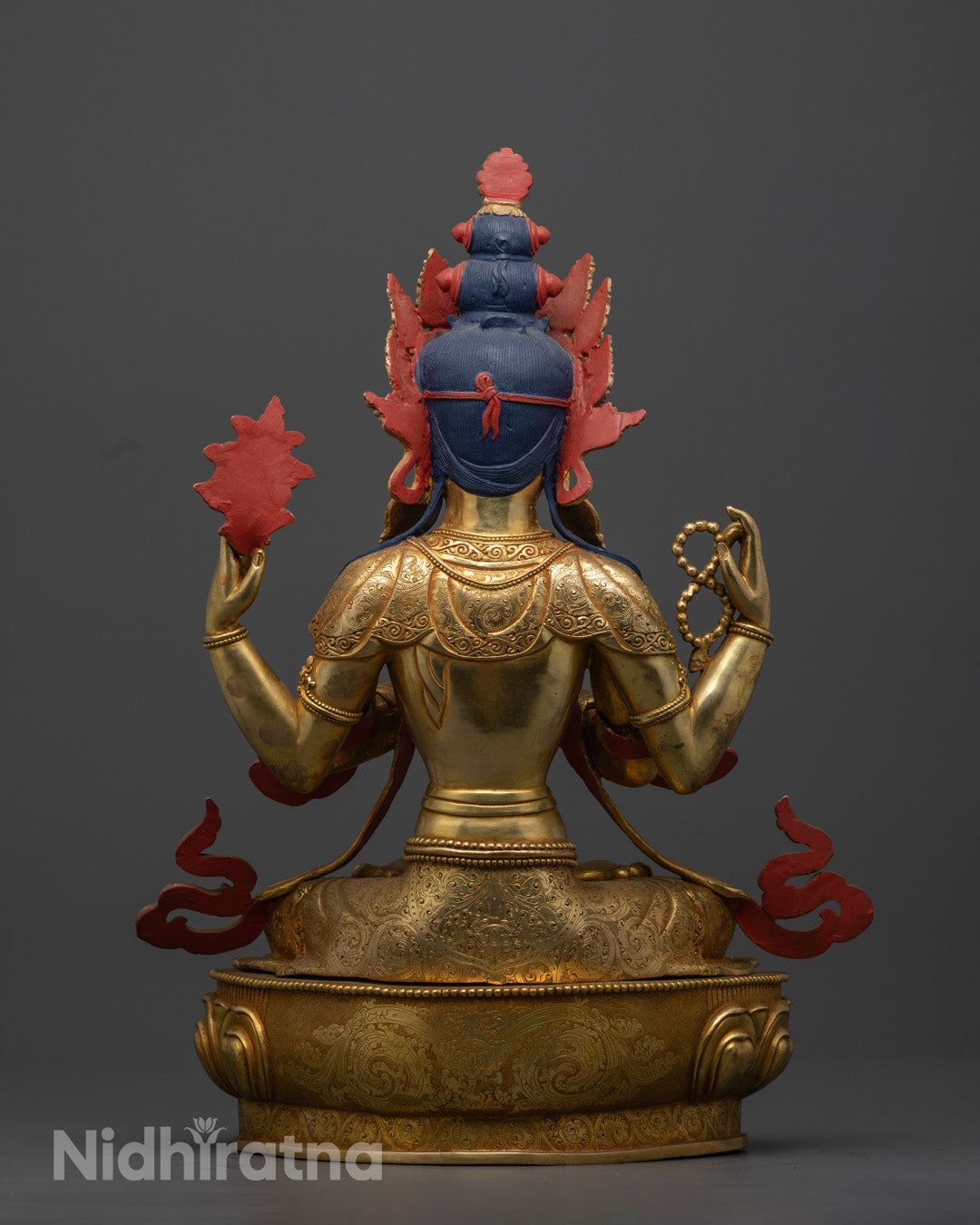 Utpala flower on Handmade Chenrezig Sculpture, a blue lotus symbolizing purity, compassion, and spiritual awakening for mindful home decor.