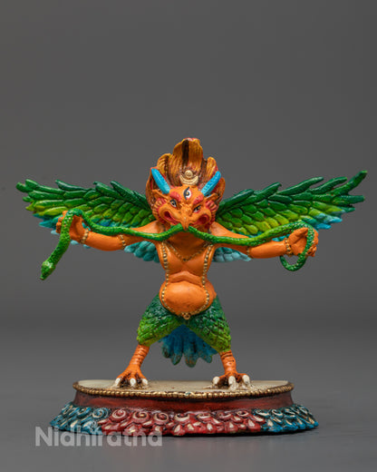 Vahana of Vishnu Garuda statue with copper body and vibrant acrylic colors featuring multi-colored wings and radiant halo