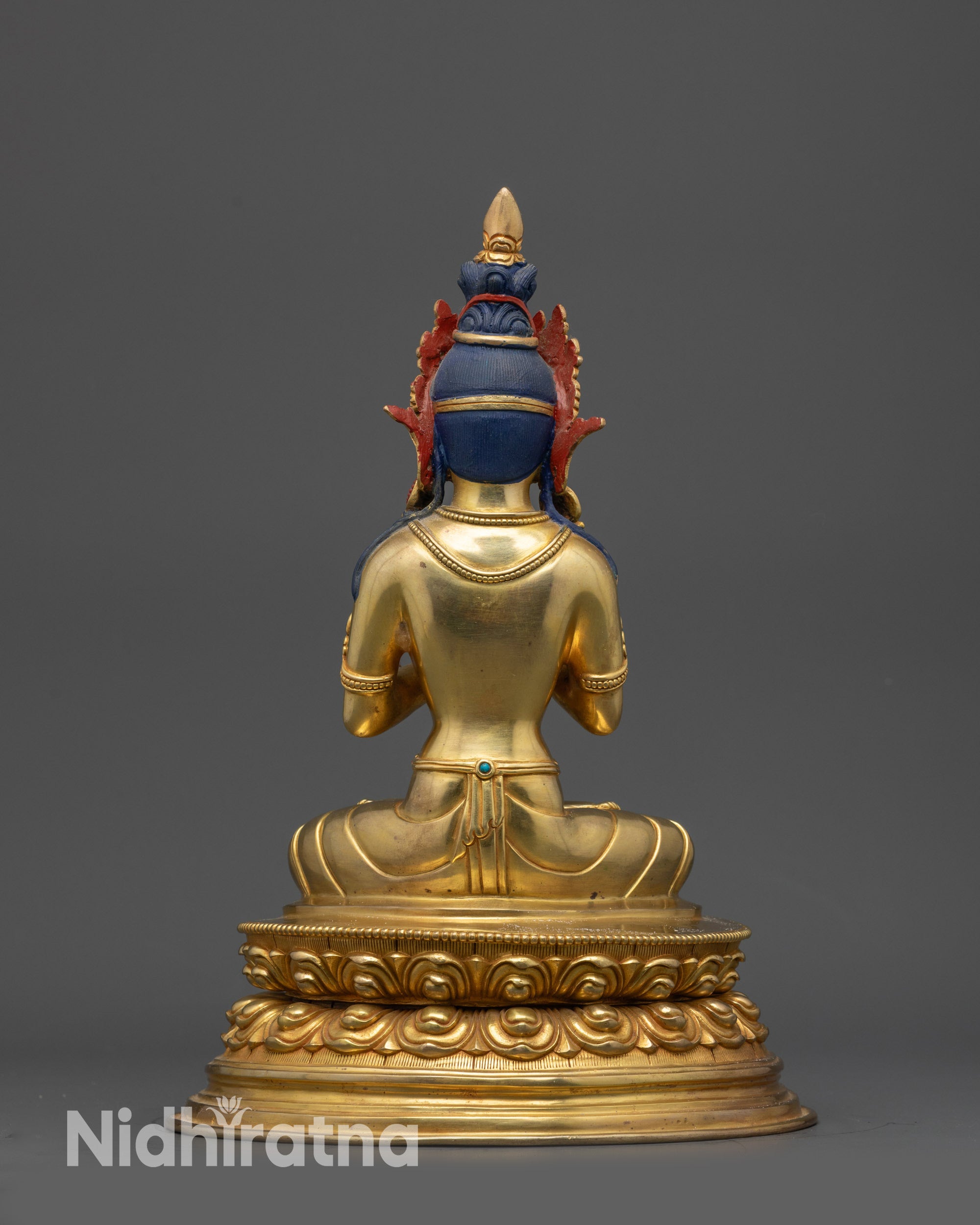 Vairochana Statue back view highlighting detailed floral and motif patterns on garments