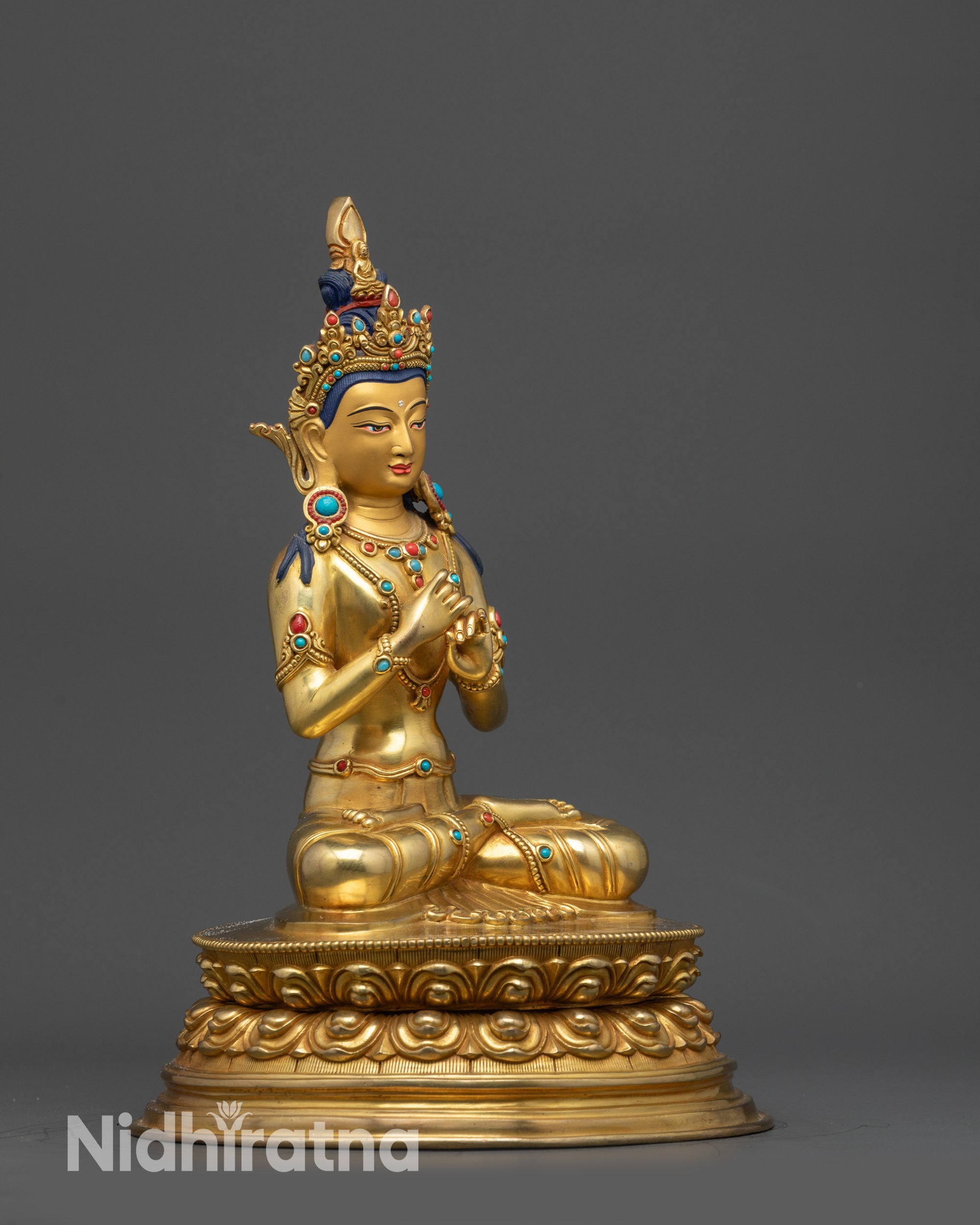 Vairochana Statue side view displaying Dharmachakra mudra and intricate carved robe