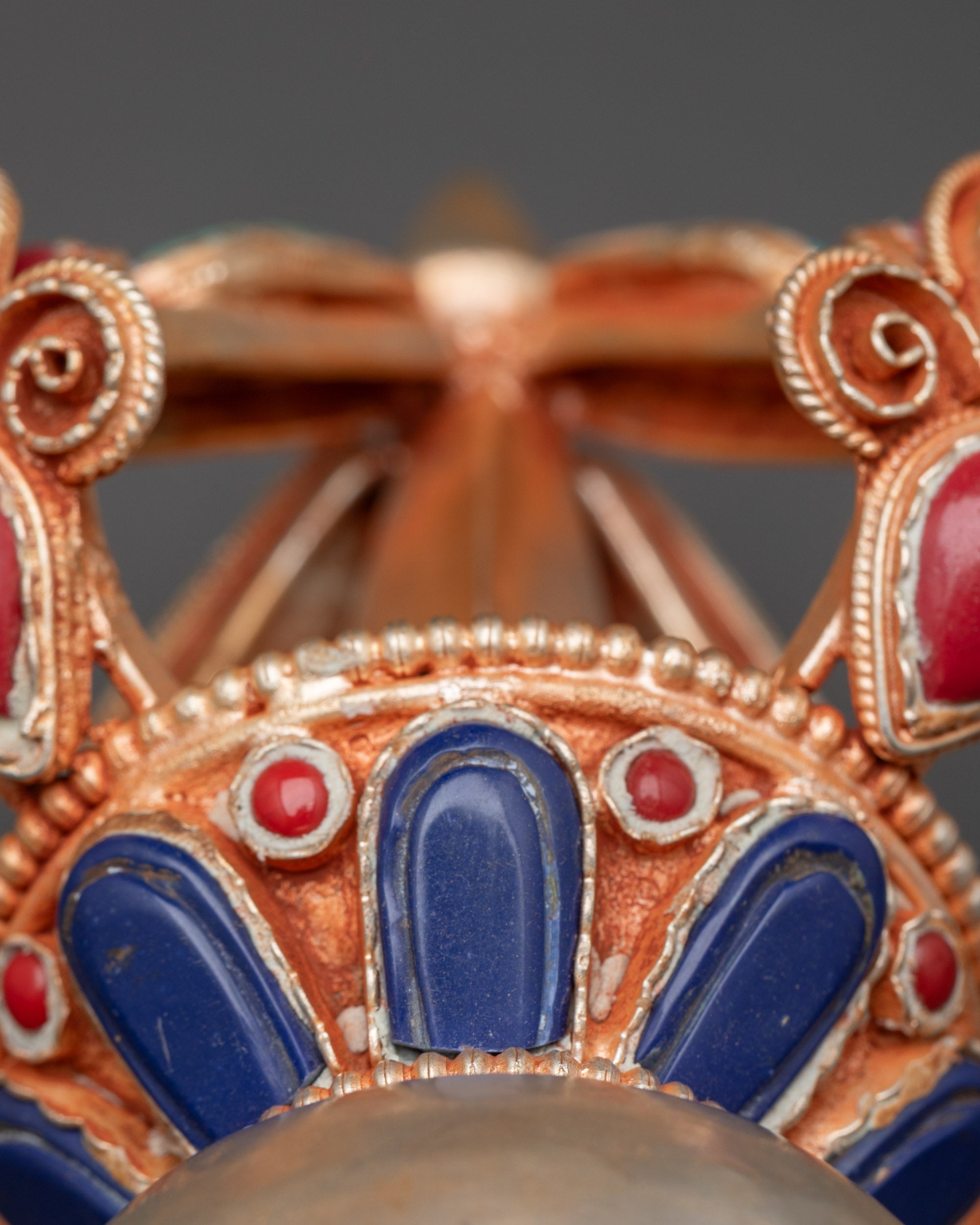 Vajra with detailed filigree design and semi-precious stone inlays for rituals