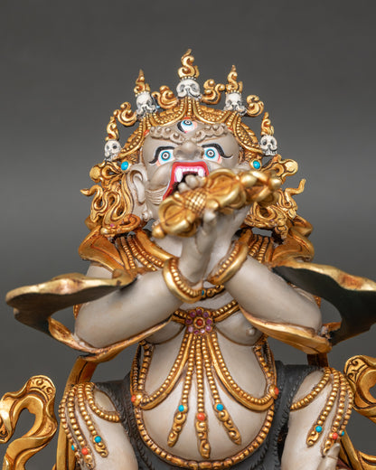 Vajradhaka statue close up, gold gilded details on copper incense burner