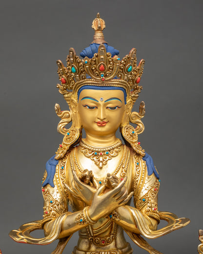 Vajradhara Buddha Statue close up showing gold-gilded face and lotus seat