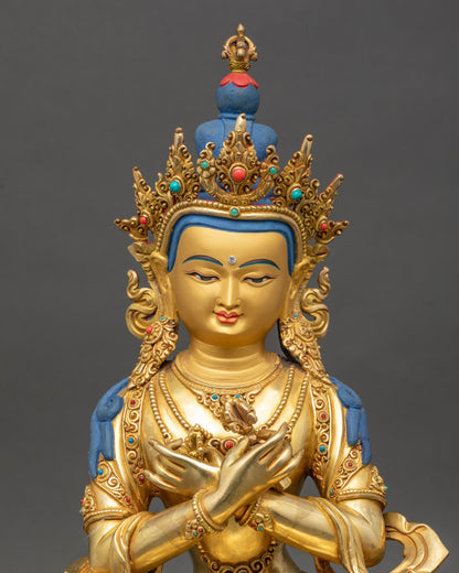 Vajradhara Buddha Statue close up view showing serene face and lotus seat