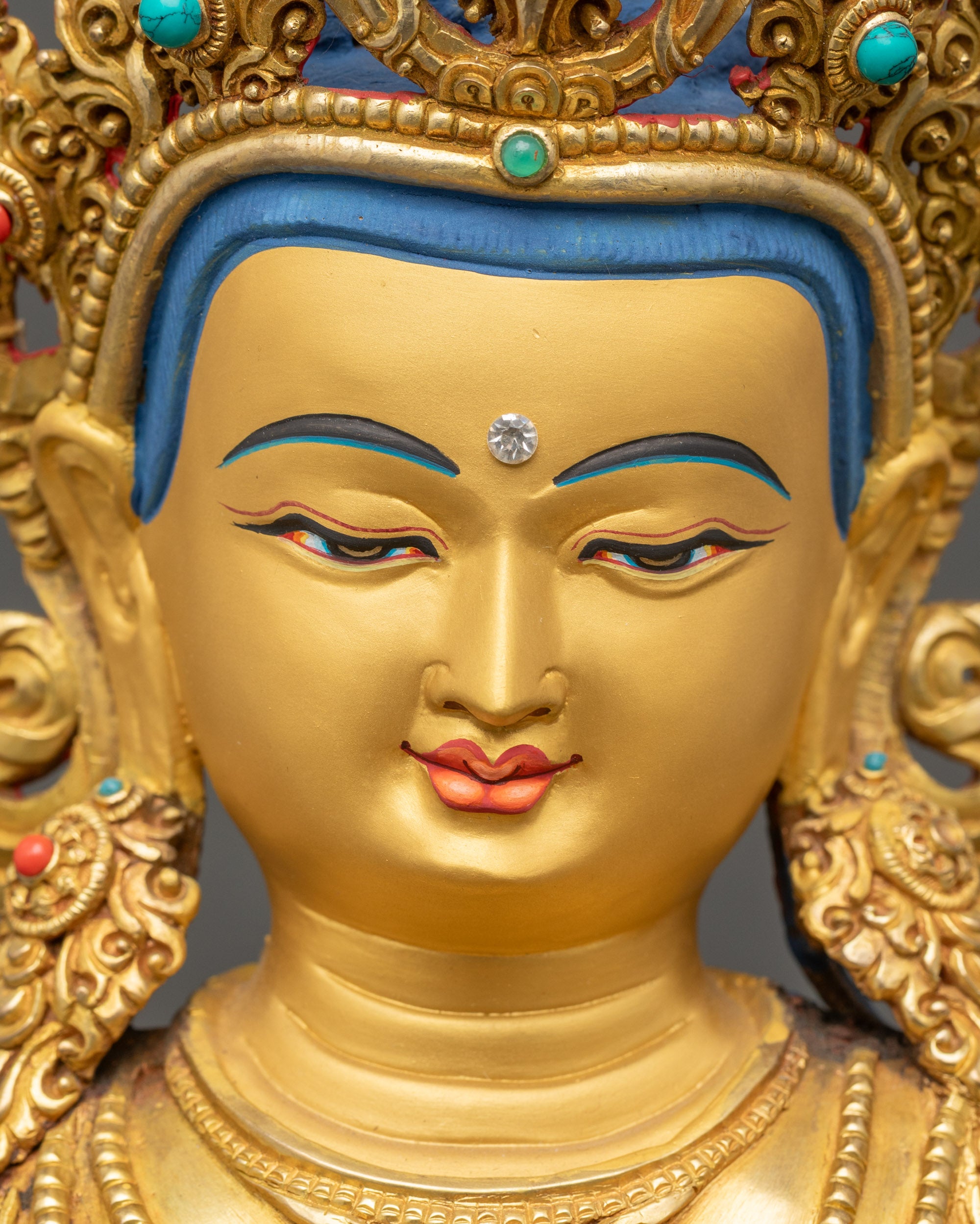 Vajradhara Buddha gold-gilded face detailed close up Nepalese craftsmanship