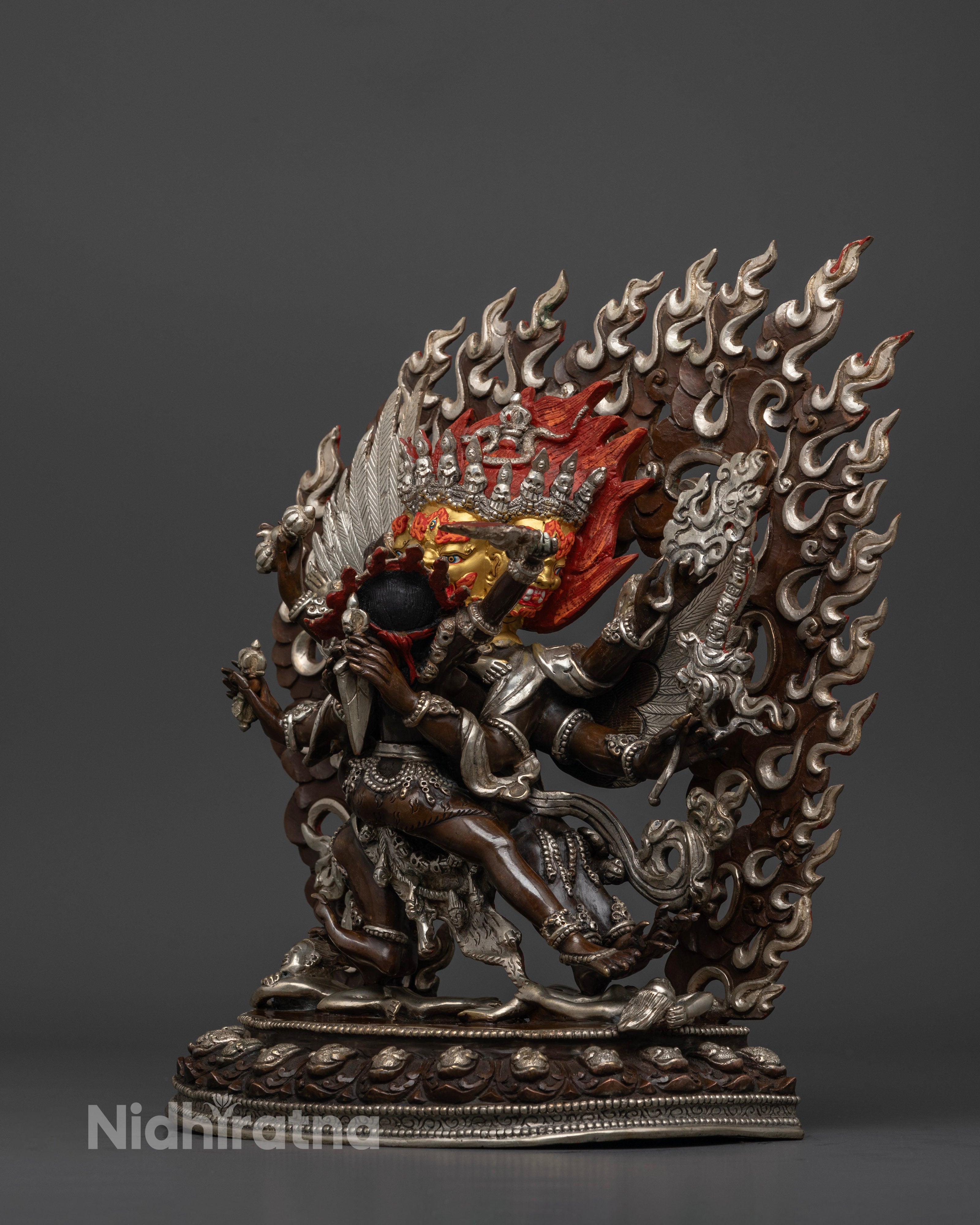 Vajrakilaya statue, focusing on the radiant sun disk backdrop and the flowing ornamental details that emphasize divine energy, purity, and enlightened protection.


