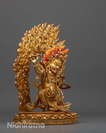 Vajrapani Statue holding vajra and bell with golden halo standing on lotus platform