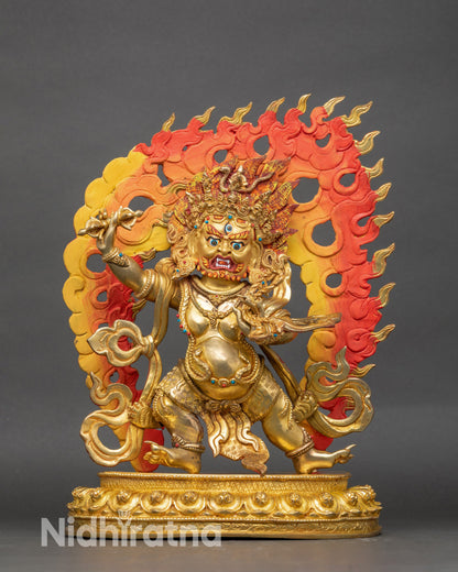 Vajrapani statue, gilded copper, wrathful face, vajra and lasso in raised arms