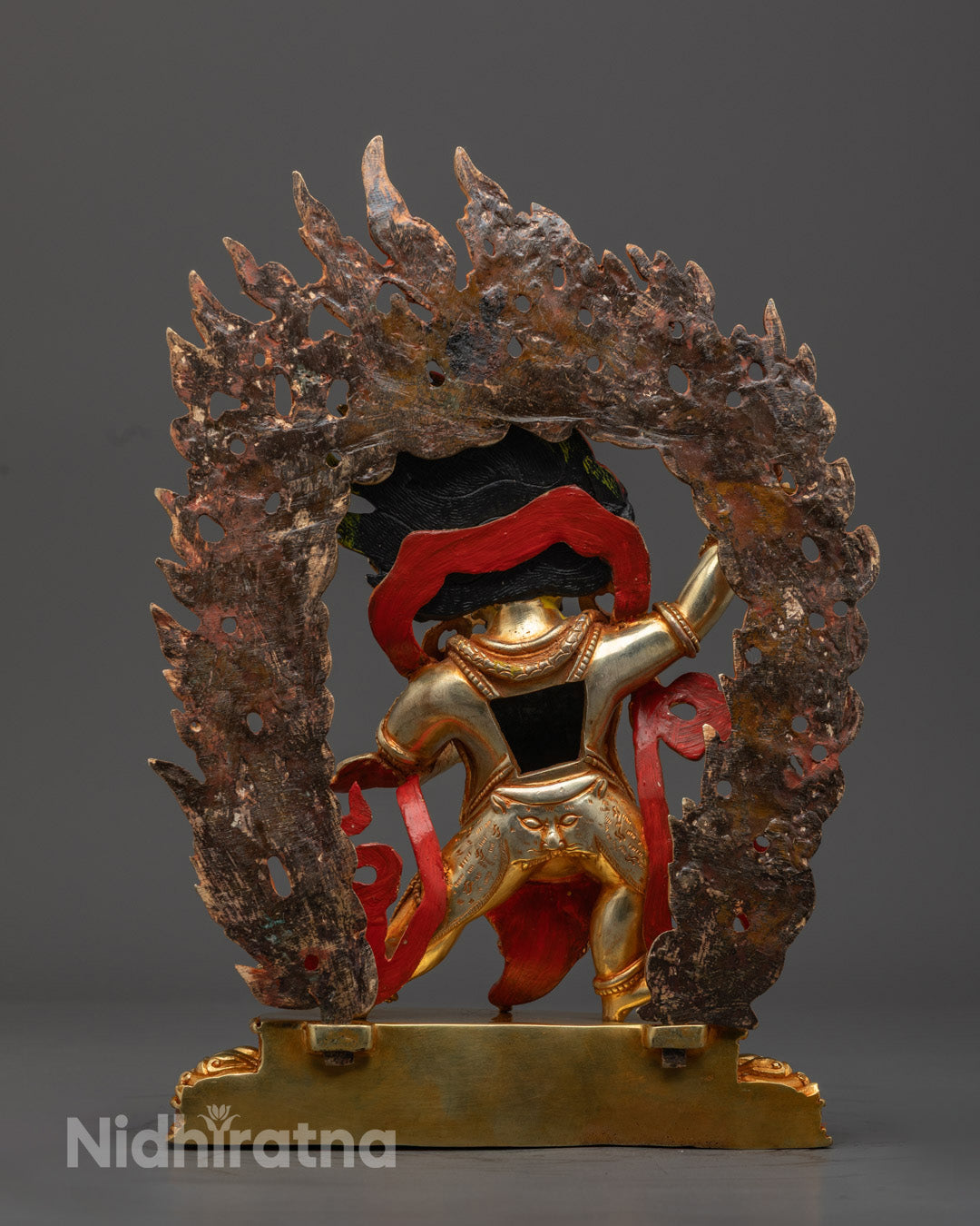  Vajrapani statue with menacing mudra and vibrant multi-colored finish, symbolizing protection and spiritual awakening in Buddhist art.