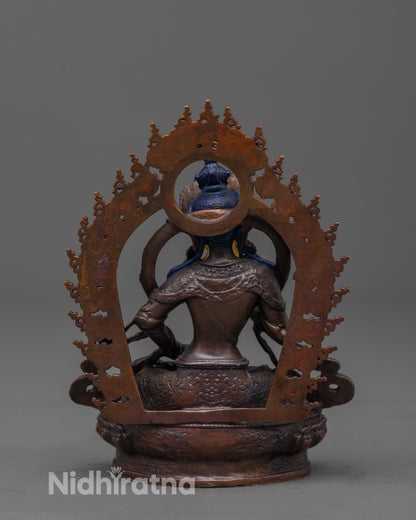 back view of oxidized copper vajrasattva statue highlighting robe details and deep-toned finish