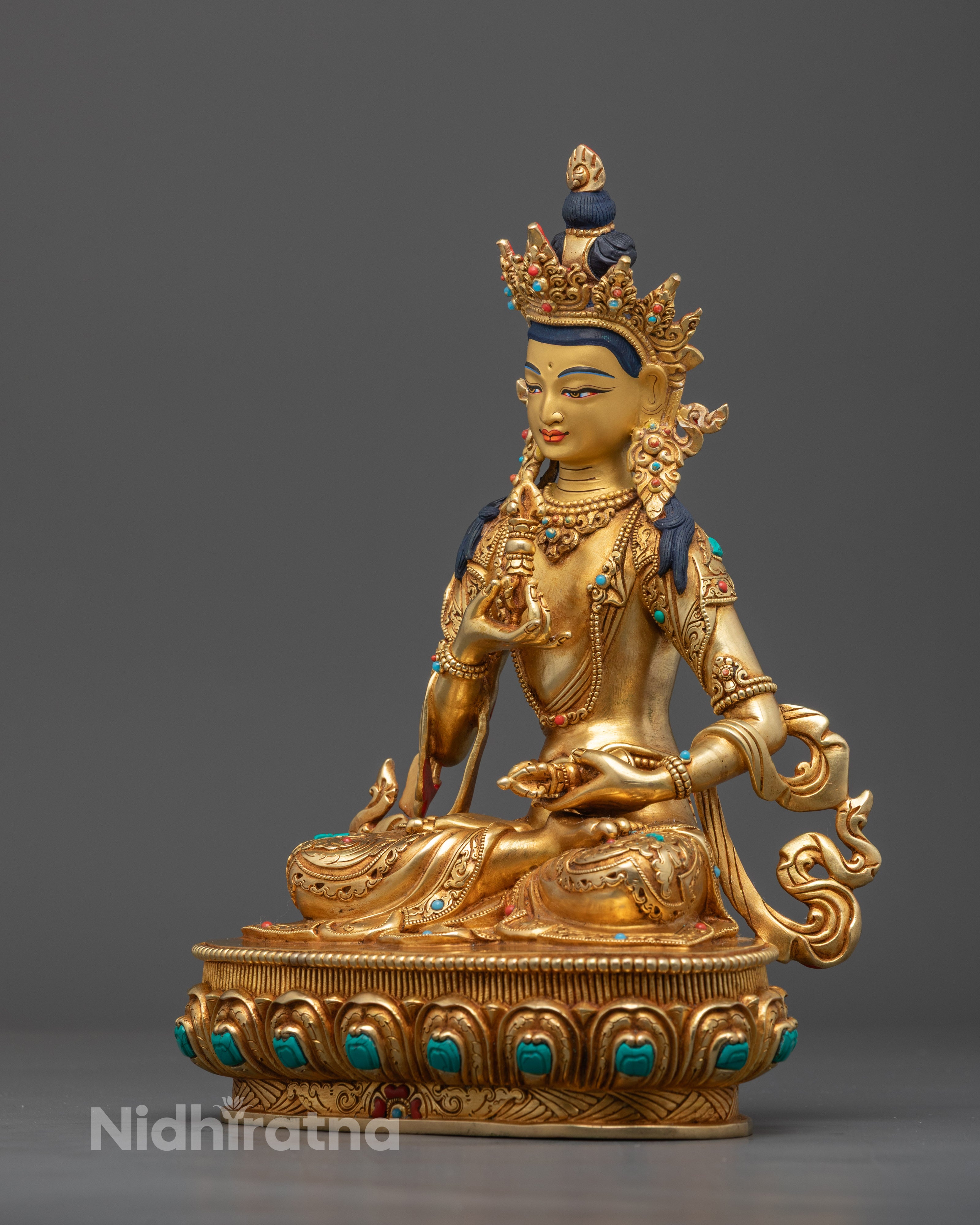Hand-carved Vajrasattva sculpture, pure copper body with gold finish, Tibetan spiritual statue for altar or decor.
