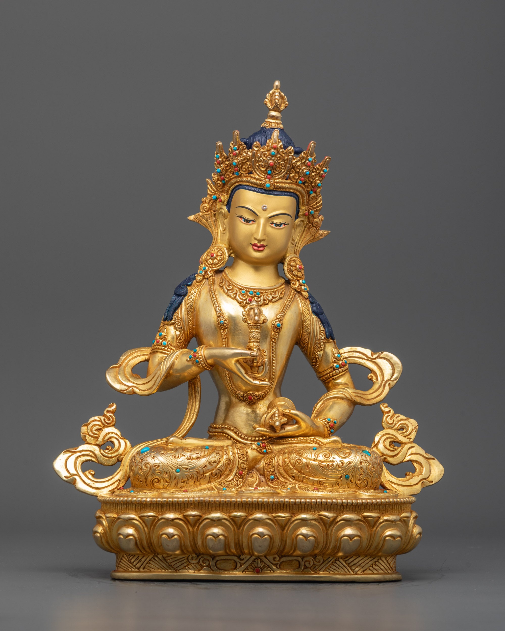 Hand-carved Vajrasattva Statue sitting on a lotus seat holding a vajra in one hand