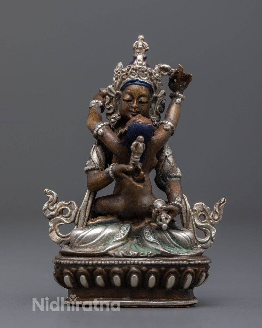 Vajrasattva Consort Statue’s oxidized copper crown with silver plating and detailed carvings