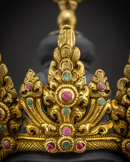 Close up of Vajrasattva Dorje Sempa five-jewelled crown with intricate carving and traditional Nepalese design