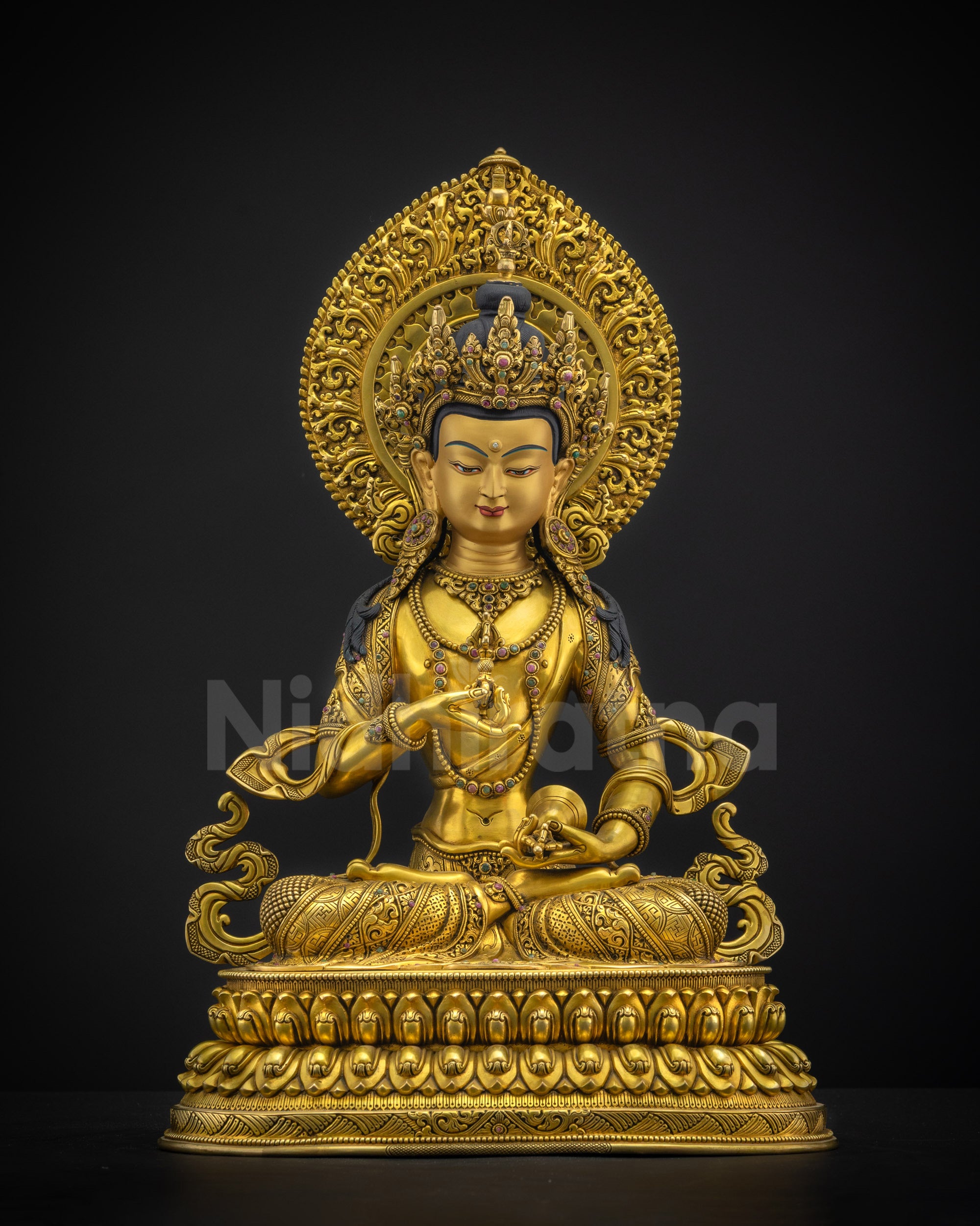 Front view of Vajrasattva Dorje Sempa statue seated on double lotus pedestal with vajra and bell