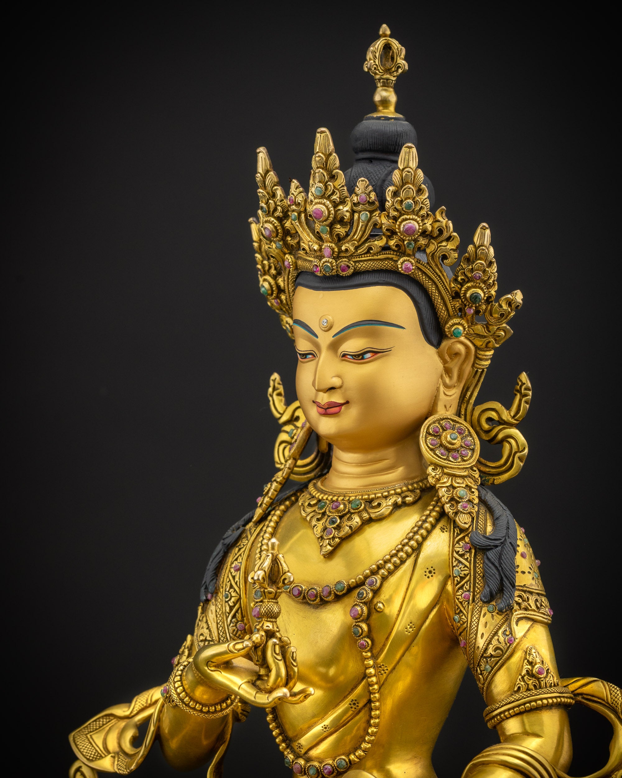 Side close up of Vajrasattva statue highlighting lost wax casting and detailed 3D carving
