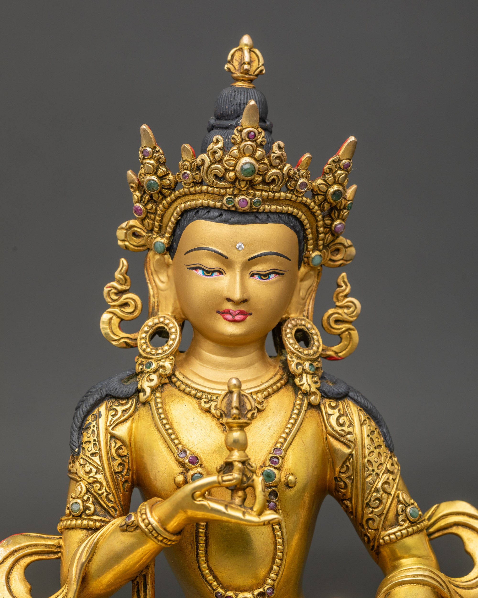 Vajrasattva meditation statue close-up showing intricate gold detailing, sacred Dorje Sempa figure from Nepal