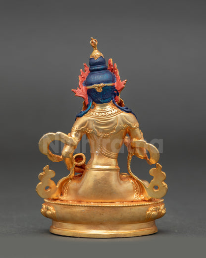 Vajrasattva statue with gold painted face and fire-gilded body seated on lotus seat