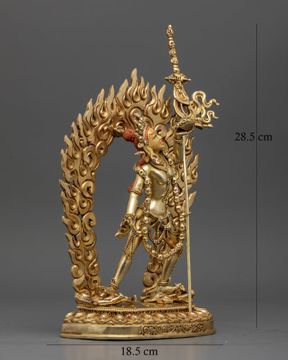 Vajrayogini standing on lotus pedestal with subdued figures and blazing halo from Nepal.