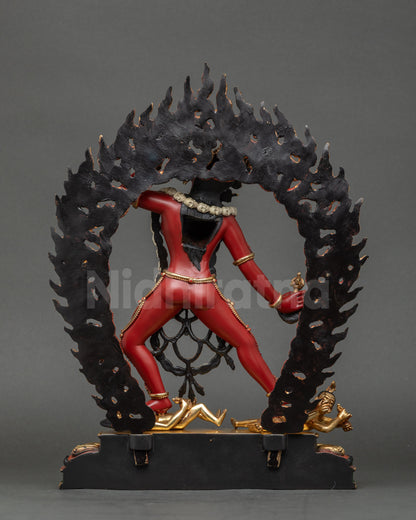 Vajrayogini Statue back view showing carved halo with flames and skull motifs