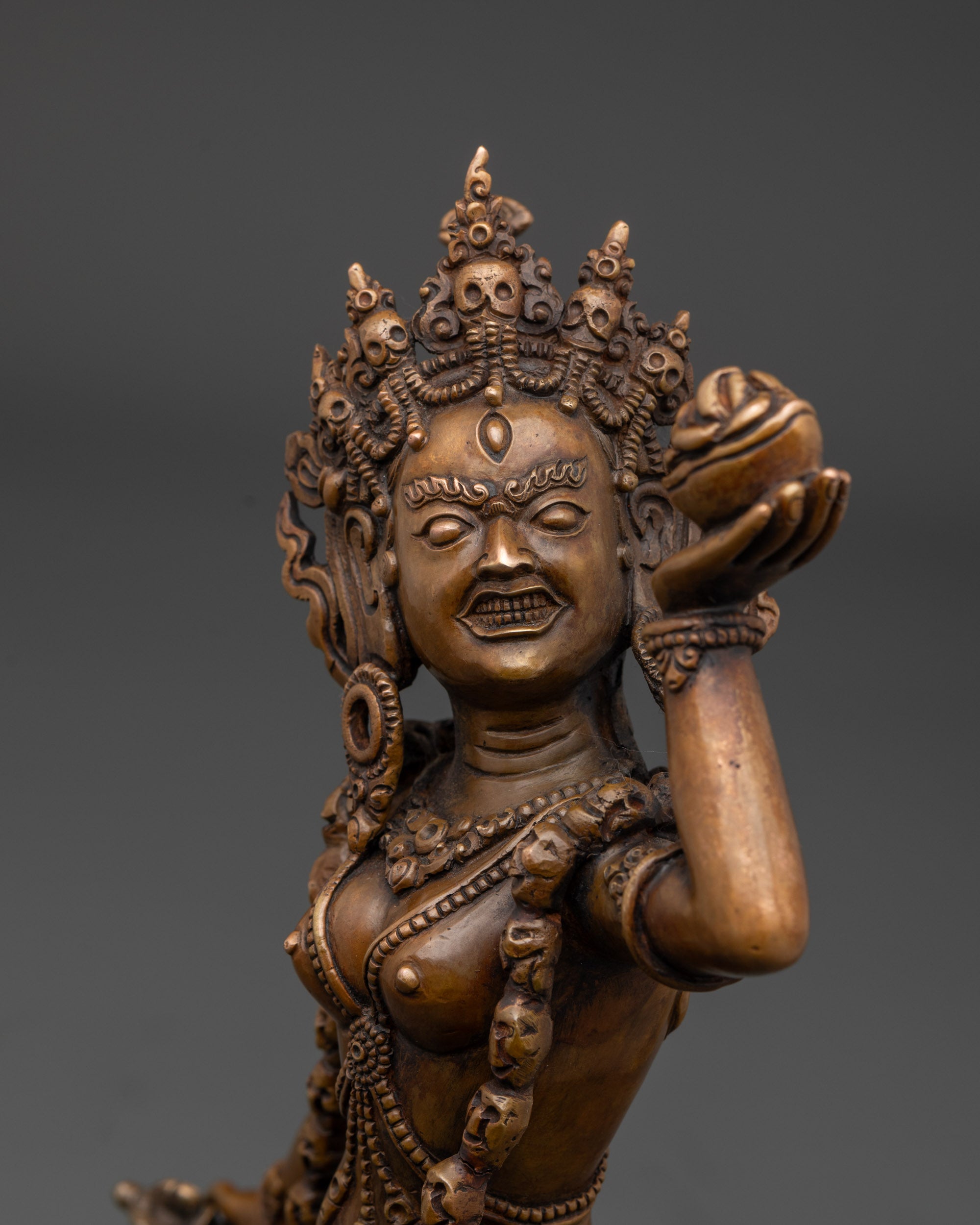Vajrayogini detailed side close up face five-skull crown wrathful tantric goddess statue
