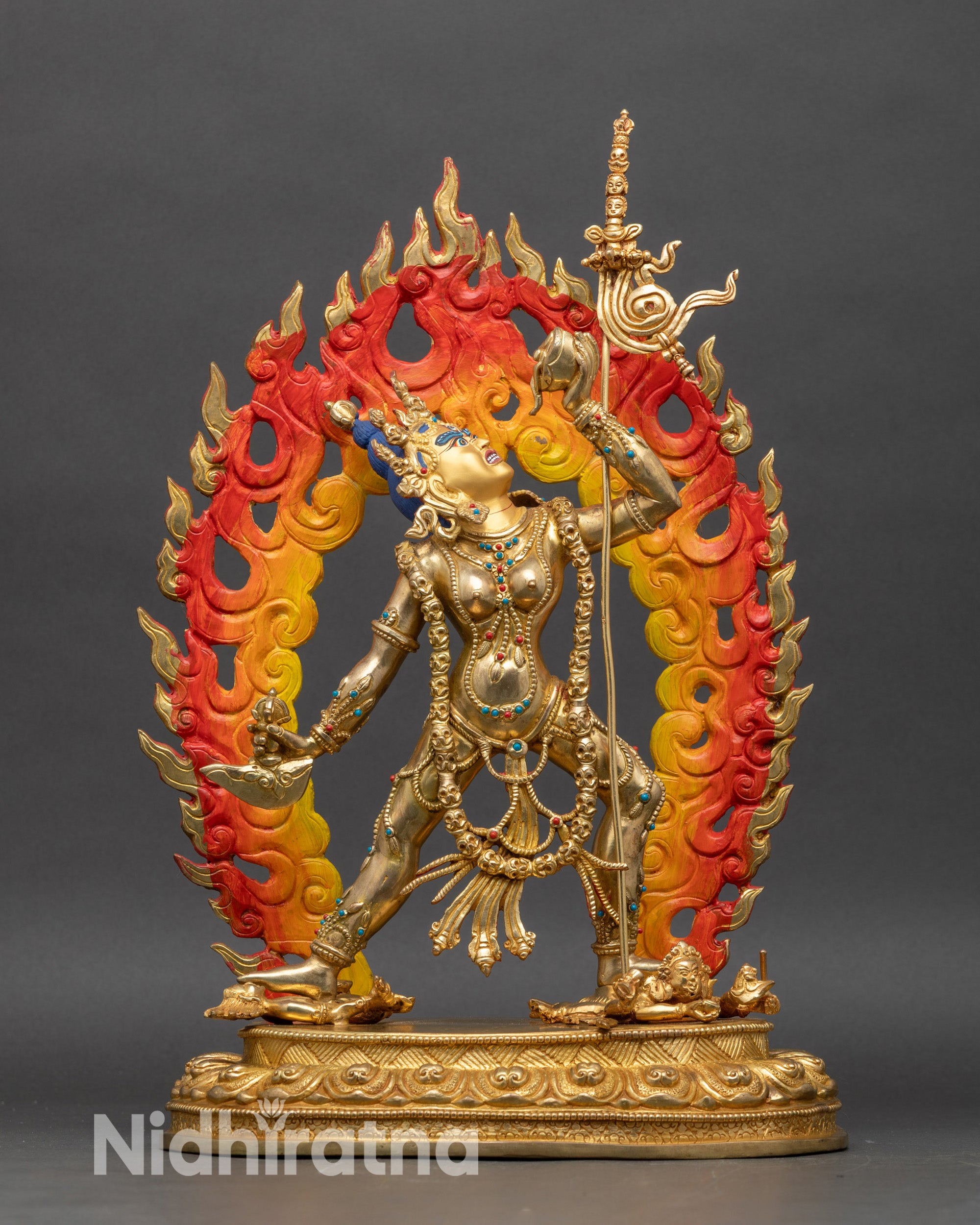 Vajrayogini statue with gold-painted face and wrathful expression, handcrafted Nepalese art