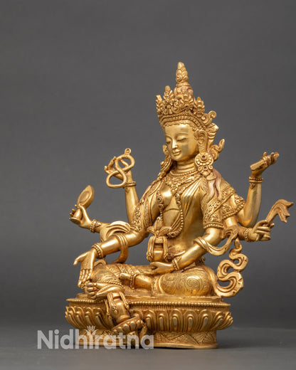 Vasudhara wealth deity statue seated on lotus throne gold gilded Nepalese art