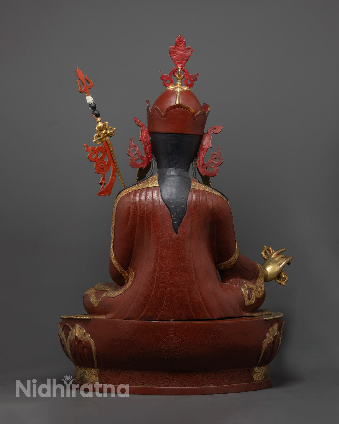 Vibrantly colored Guru Rinpoche (Padmasambhava) Statue painted with acrylics, showcasing detailed craftsmanship and adorned with semi-precious stones.