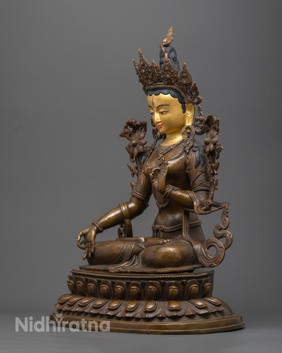 Handmade White Tara sculpture with seven eyes and blue uptala flower – perfect for home altar or spiritual gift