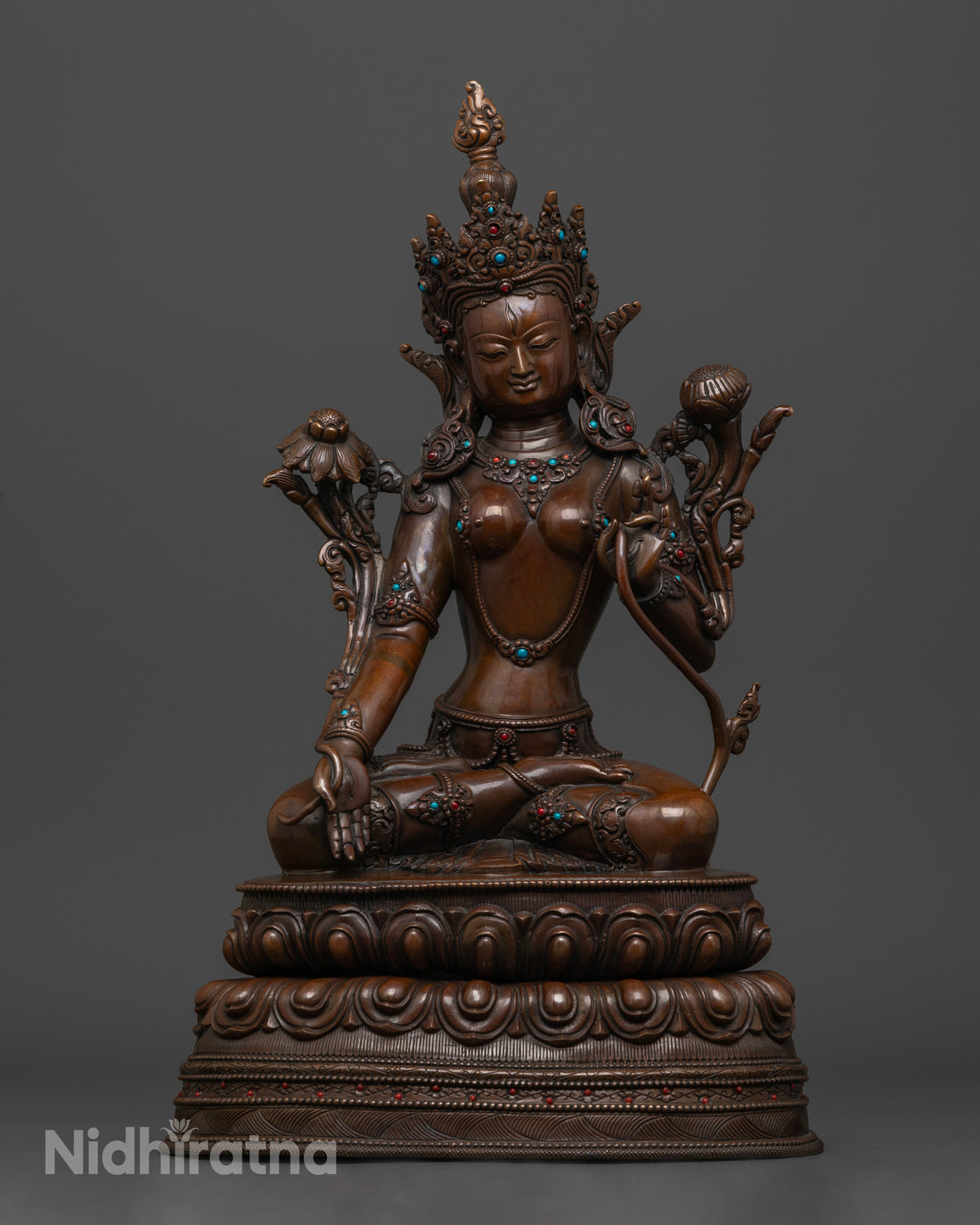 oxidized statue of White Tara