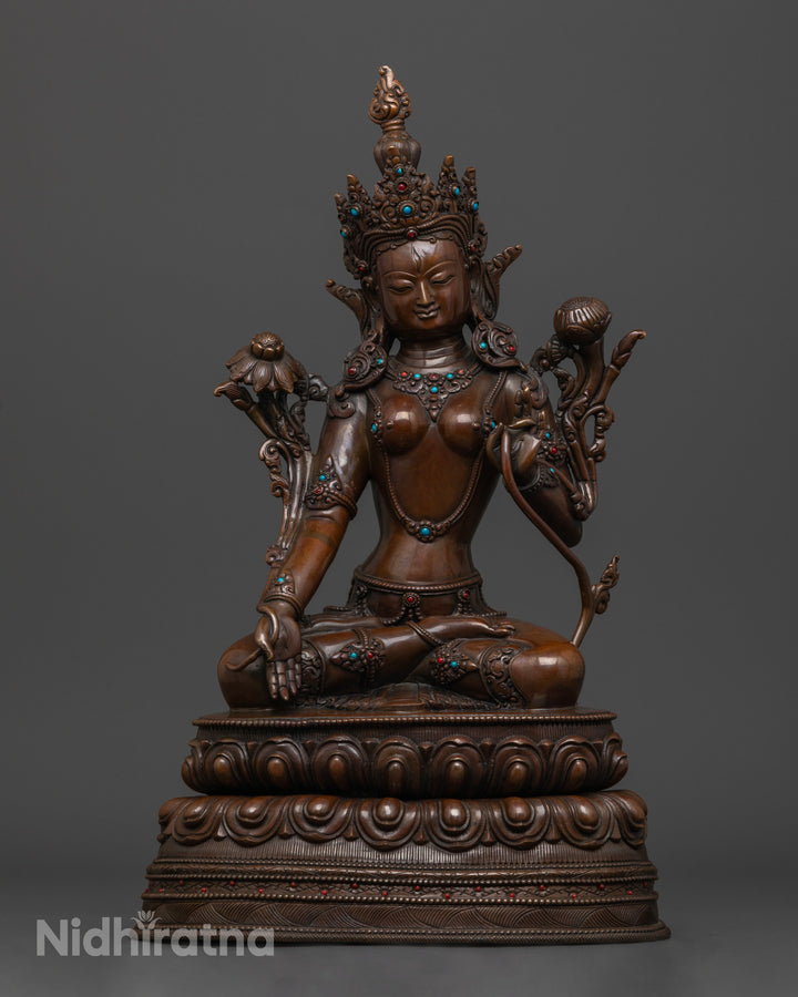 oxidized statue of White Tara