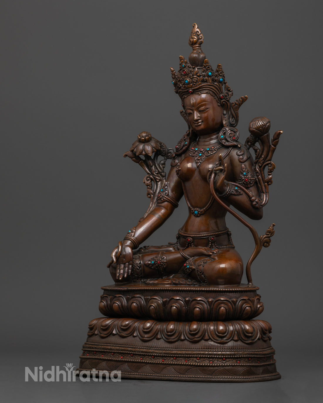 side profile of oxidized White Tara statue