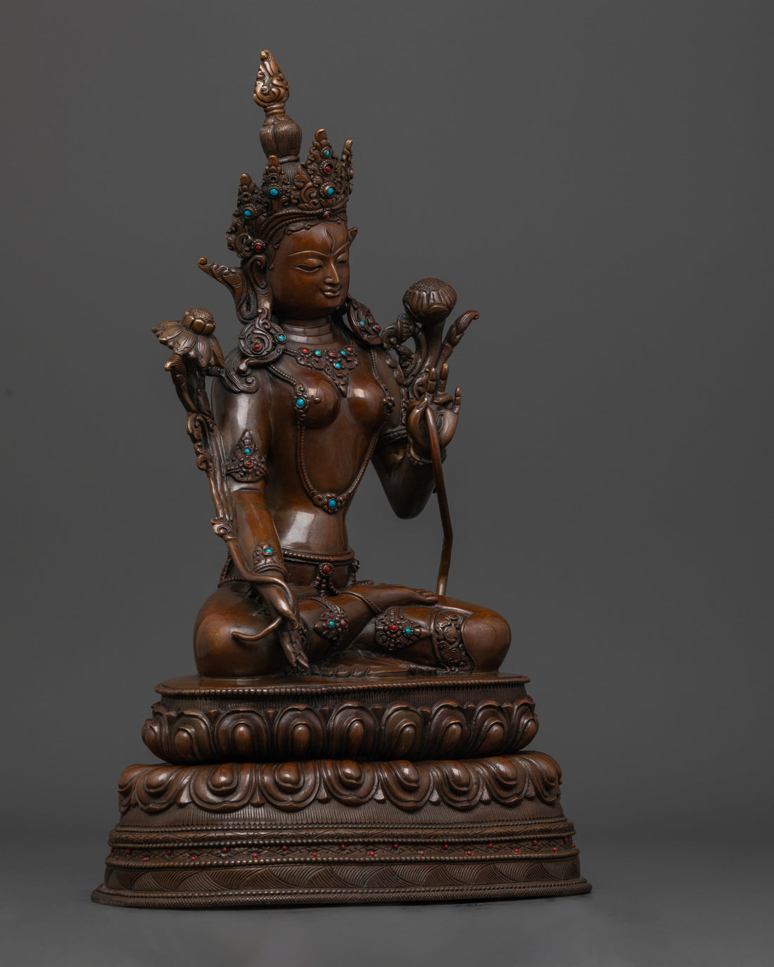 side profile of oxidized White Tara statue