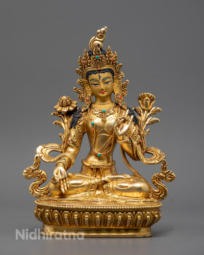 White Tara Buddhist statue seated in meditation on a lotus throne, adorned with 24K gold gilding and turquoise gemstone details.